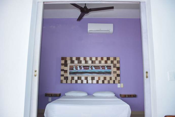 Imagen de la habitación del Hotel El Fuerte Beach Resort. Foto 9