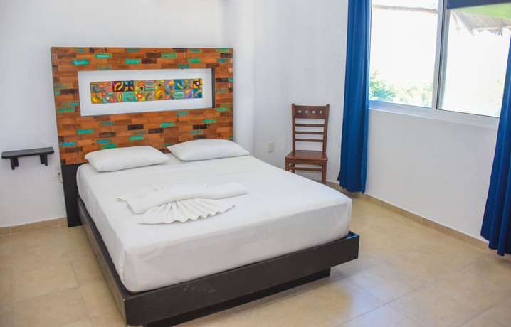 Imagen de la habitación del Hotel El Fuerte Beach Resort. Foto 13
