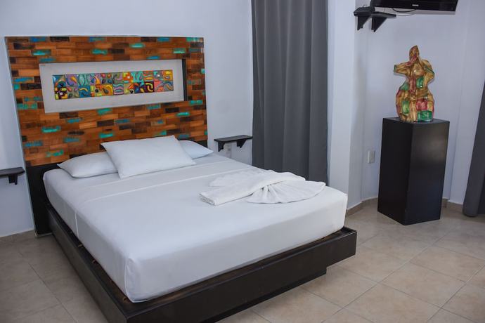 Imagen de la habitación del Hotel El Fuerte Beach Resort. Foto 14