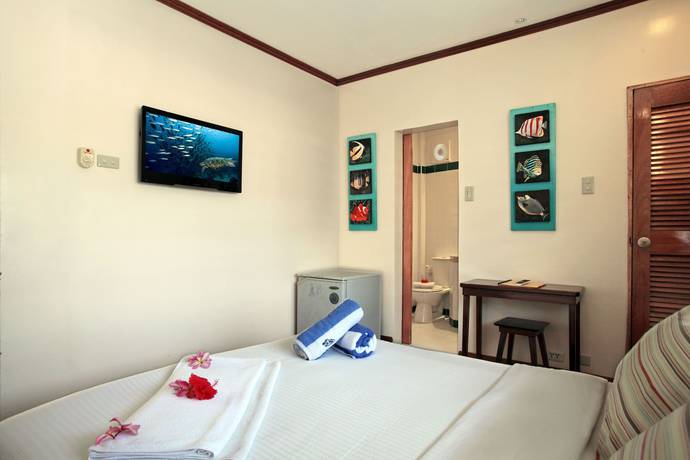Imagen de la habitación del Hotel El Galleon Beach Resort Asia Divers. Foto 3