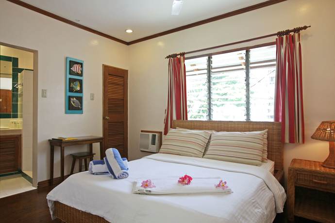 Imagen de la habitación del Hotel El Galleon Beach Resort Asia Divers. Foto 4