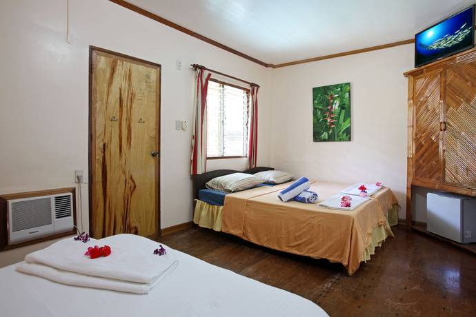 Imagen de la habitación del Hotel El Galleon Beach Resort Asia Divers. Foto 6