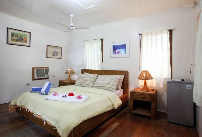 Imagen de la habitación del Hotel El Galleon Beach Resort Asia Divers. Foto 8