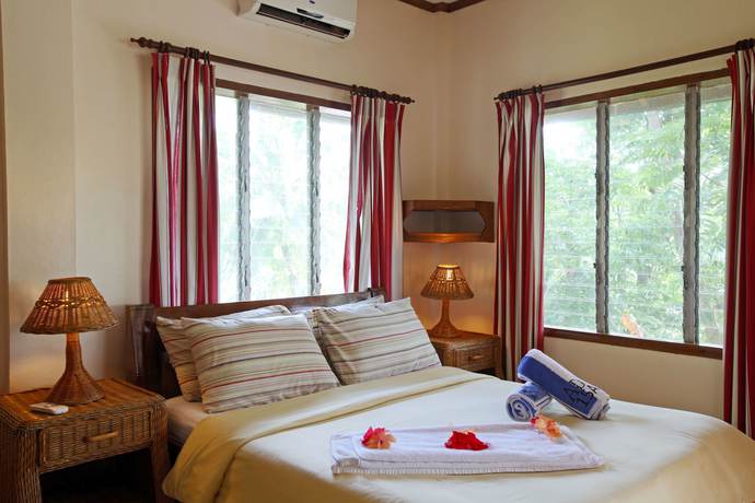 Imagen de la habitación del Hotel El Galleon Beach Resort Asia Divers. Foto 9