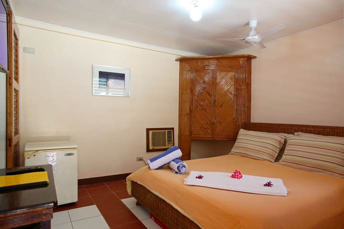 Imagen de la habitación del Hotel El Galleon Beach Resort Asia Divers. Foto 12