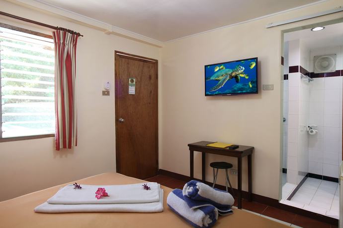 Imagen de la habitación del Hotel El Galleon Beach Resort Asia Divers. Foto 20
