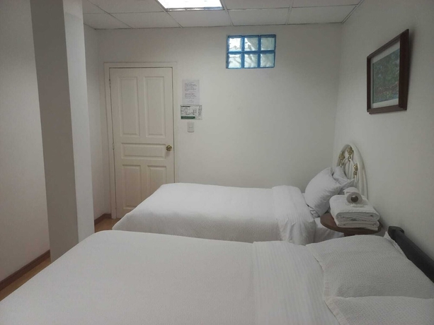 Imagen de la habitación del Hotel El Geranio. Foto 3