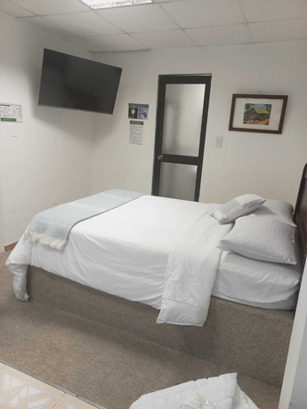 Imagen de la habitación del Hotel El Geranio. Foto 4