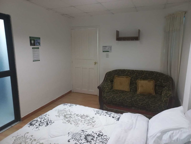 Imagen de la habitación del Hotel El Geranio. Foto 5
