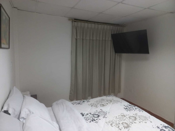 Imagen de la habitación del Hotel El Geranio. Foto 10