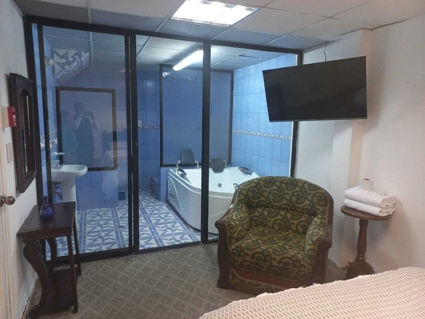 Imagen de la habitación del Hotel El Geranio. Foto 13
