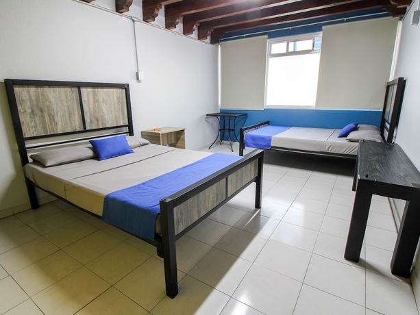 Imagen de la habitación del Hotel El Gran Hostal. Foto 6