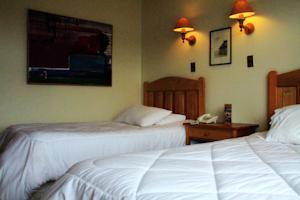Imagen de la habitación del Hotel El Greco, Puerto Varas. Foto 2