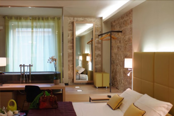 Imagen de la habitación del Hotel El Homs Palace. Foto 4