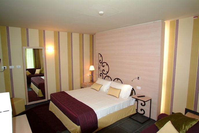 Imagen de la habitación del Hotel El Homs Palace. Foto 6