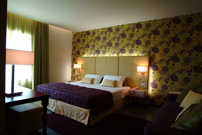 Imagen de la habitación del Hotel El Homs Palace. Foto 14