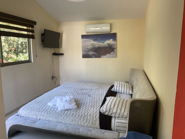 Imagen de la habitación del Hotel El Jard&iacute;n De En Medio. Foto 3