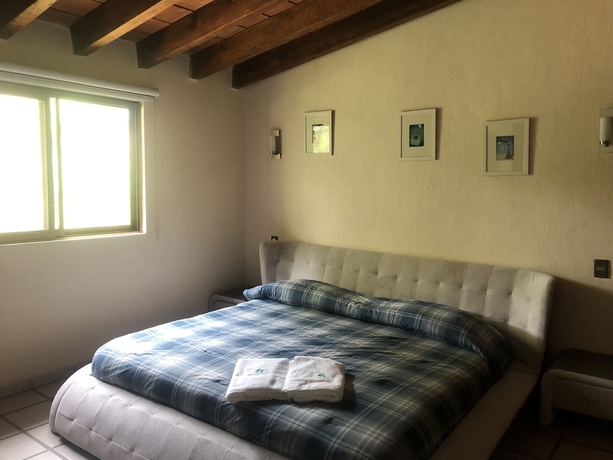 Imagen de la habitación del Hotel El Jard&iacute;n De En Medio. Foto 4