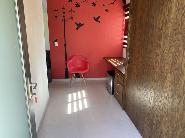 Imagen de la habitación del Hotel El Jard&iacute;n De En Medio. Foto 7