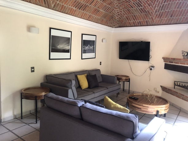 Imagen de la habitación del Hotel El Jard&iacute;n De En Medio. Foto 9