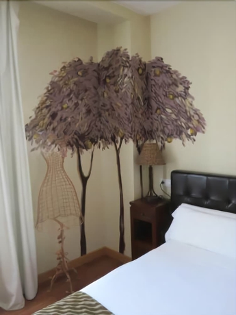 Imagen de la habitación del Hotel El Jardín De Eugenia. Foto 9