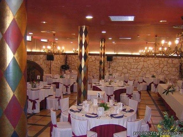 Imagen del bar/restaurante del Hotel El Jardín De La Abadía. Foto 2