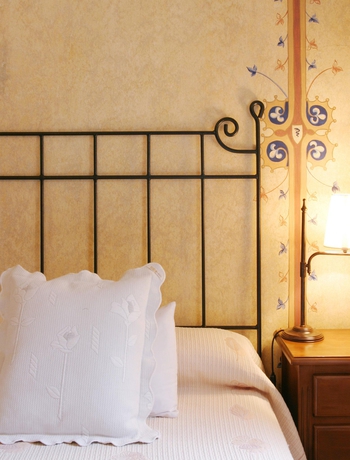 Imagen de la habitación del Hotel El Jardín De La Abadía. Foto 5