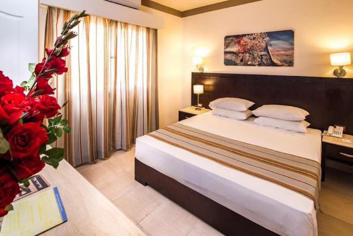 Imagen de la habitación del Hotel El Karma Aqua Beach Resort. Foto 16