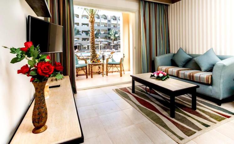 Imagen de la habitación del Hotel El Karma Aqua Beach Resort. Foto 17