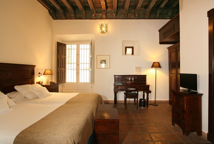 Imagen de la habitación del Hotel El Ladron De Agua Palacete. Foto 8