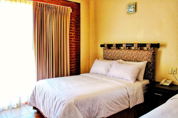Imagen de la habitación del Hotel El Laurel Boutique. Foto 4