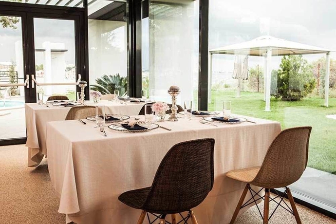 Imagen del bar/restaurante del Hotel El Locanda Boutique. Foto 5