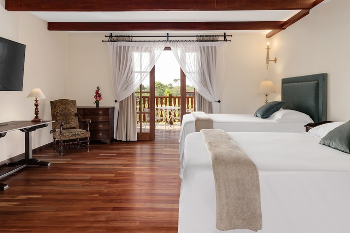 Imagen de la habitación del Hotel El Lugar. Foto 11