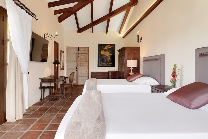 Imagen de la habitación del Hotel El Lugar. Foto 16
