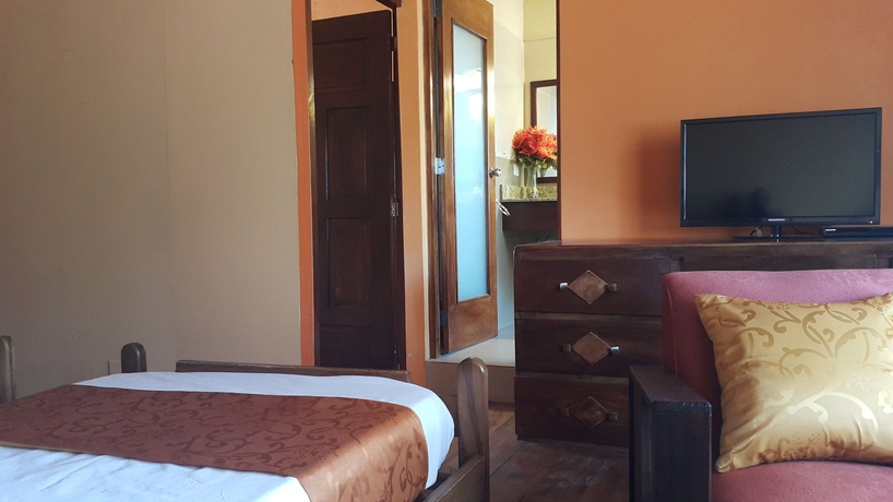 Imagen de la habitación del Hotel El Maltese. Foto 10