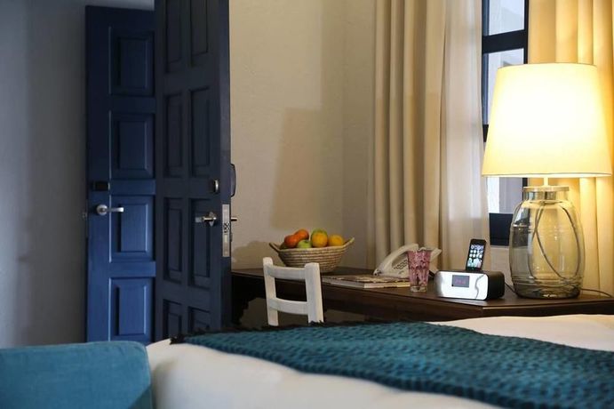 Imagen de la habitación del Hotel El Mercado. Foto 9