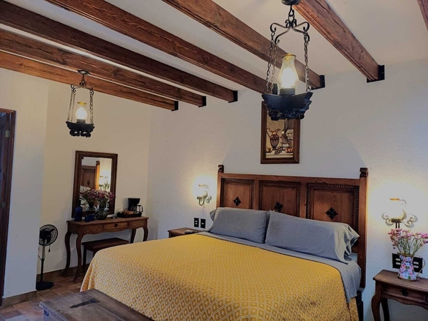 Imagen de la habitación del Hotel El Mes&oacute;n del Quijote. Foto 8