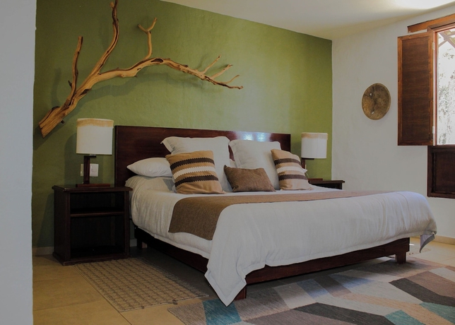 Imagen de la habitación del Hotel El Mes&oacute;n del Tic&uacute;z Tapalpa. Foto 9