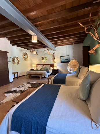 Imagen de la habitación del Hotel El Mes&oacute;n del Tic&uacute;z Tapalpa. Foto 14