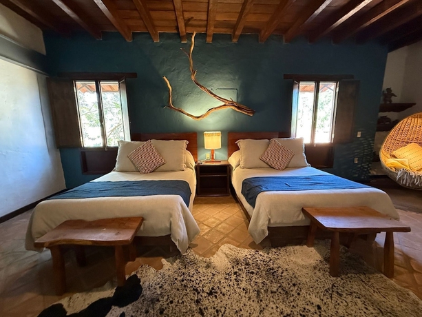 Imagen de la habitación del Hotel El Mes&oacute;n del Tic&uacute;z Tapalpa. Foto 15