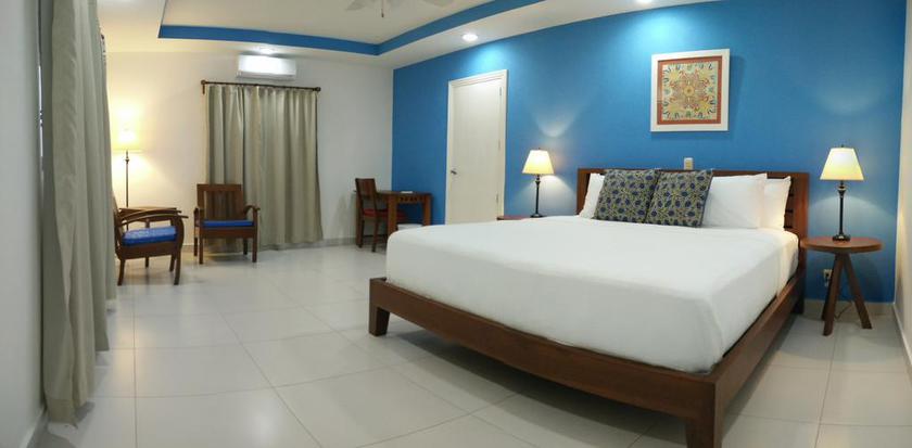 Imagen de la habitación del Hotel El Mirador Suites and Lounge. Foto 4