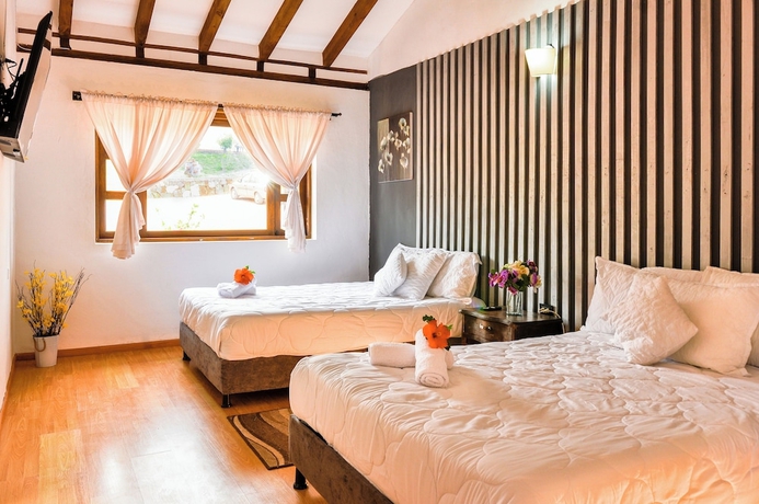 Imagen de la habitación del Hotel El Mirador Villa De Leyva. Foto 4