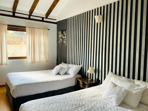 Imagen de la habitación del Hotel El Mirador Villa De Leyva. Foto 5