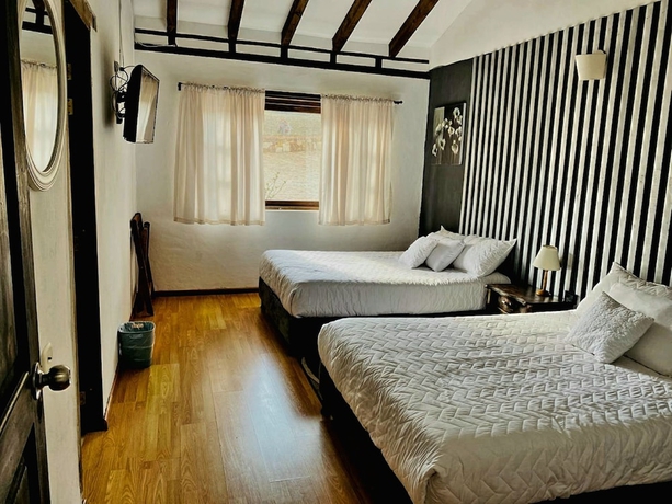 Imagen de la habitación del Hotel El Mirador Villa De Leyva. Foto 13