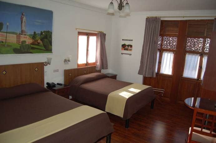 Imagen de la habitación del Hotel El Molino Alausi. Foto 11