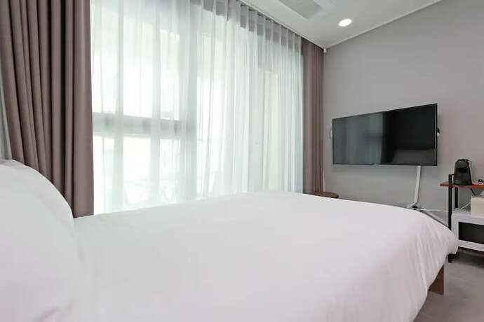 Imagen de la habitación del Hotel El Momento Gwangan. Foto 13
