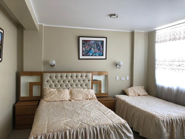 Imagen de la habitación del Hotel El Monarca Suite. Foto 8