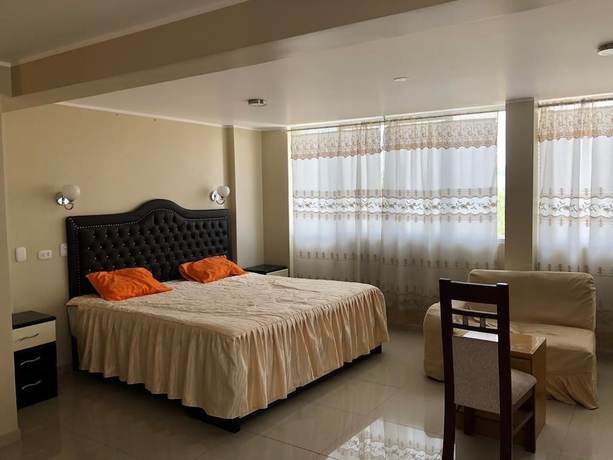 Imagen de la habitación del Hotel El Monarca Suite. Foto 11