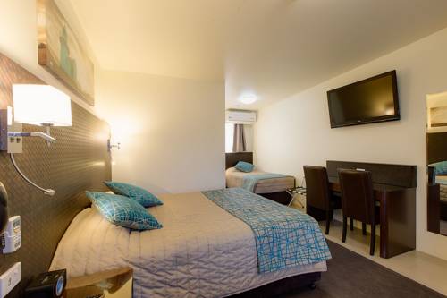 Imagen de la habitación del Hotel El Motor Inn. Foto 2