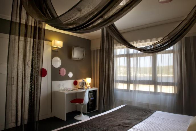 Imagen de la habitación del Hotel El Muelle. Foto 6